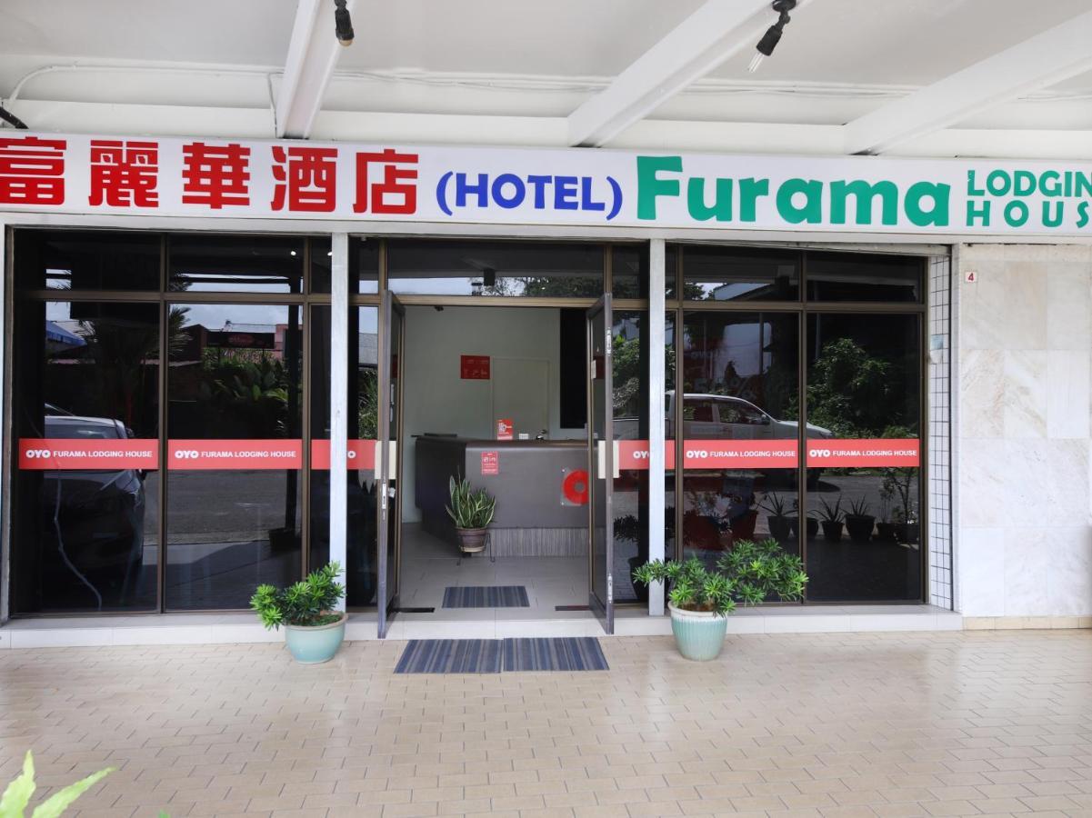 Oyo 44034 Furama Lodging House Kuching Bagian luar foto